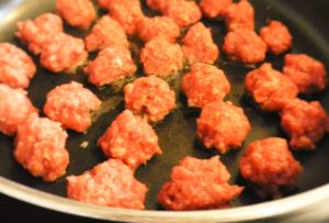 Tasty little meatballs frying in the pan! 