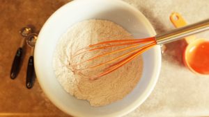 The dry ingredients combined in mixing bowl.